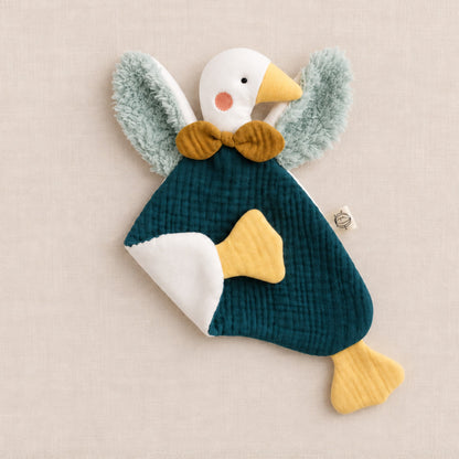 Doudou oison bleu pétrole avec patte repliée, fabriqué en France